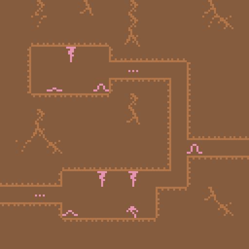 Pixelated worms in an underground cavern. One of them is wiggling.